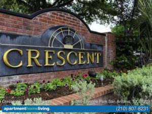 Picture of brick and metal business sign for Crescent at Alamo Heights Apartments