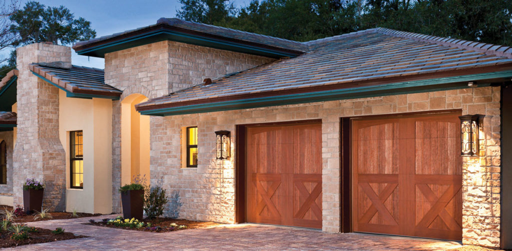 light brick home with double car garage