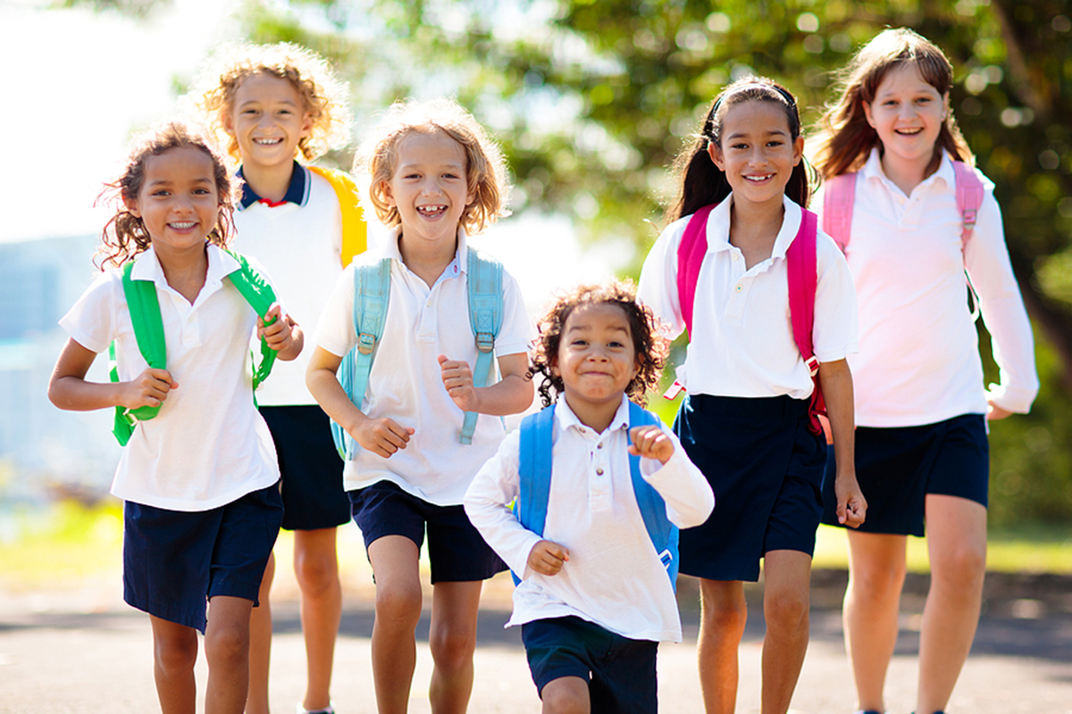 Kids Go Back To School Interracial Group Of Children Of Mixed A